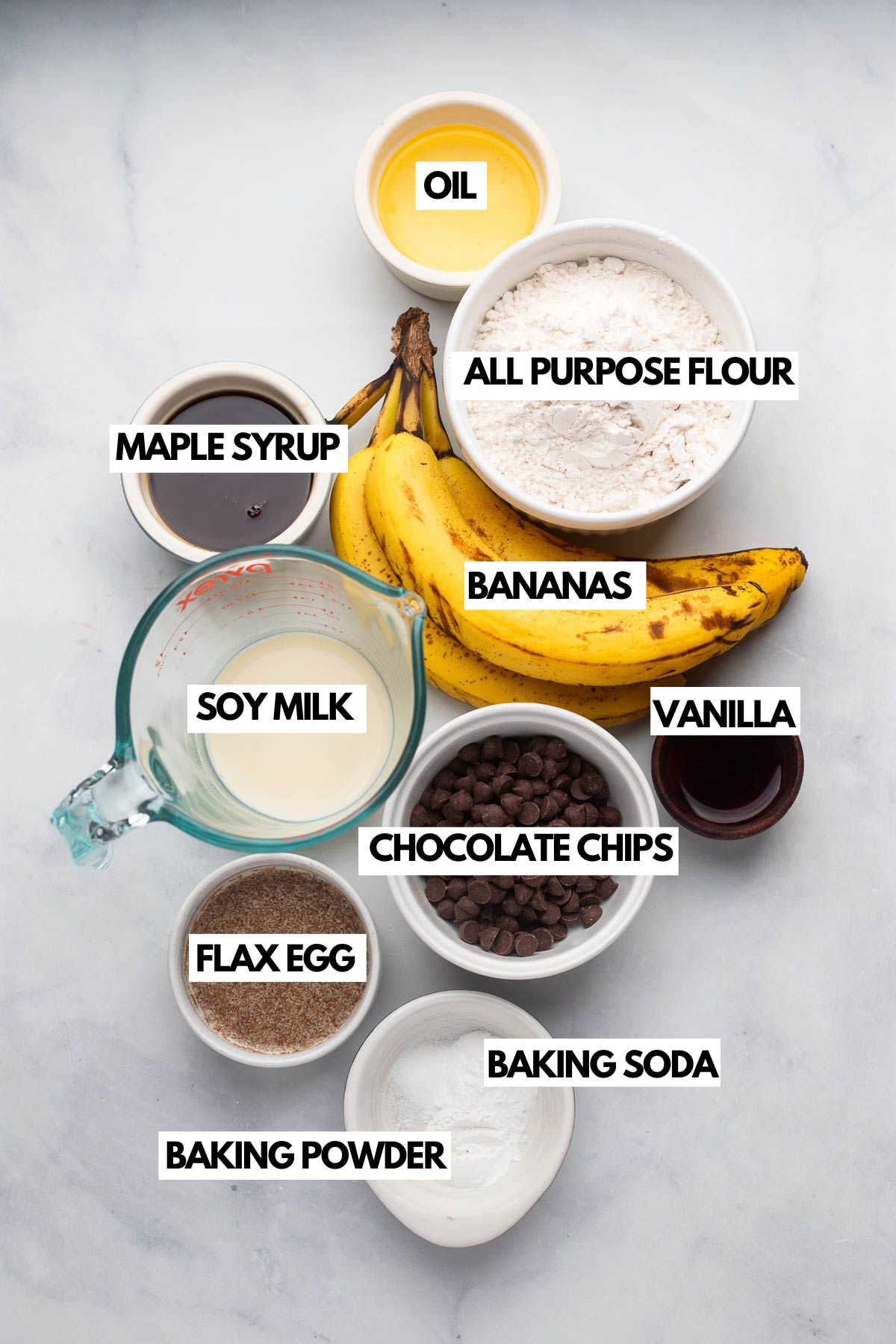 marbled banana bread ingredients in small bowls with text labels on a white background.