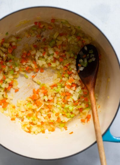 chopped onion, carrot, and celery in a large dutch oven on the stove. 
