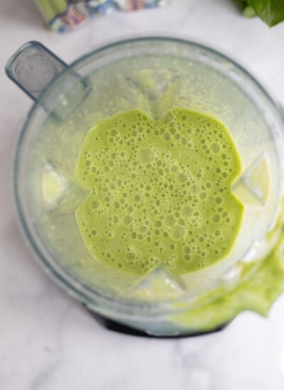 pureed celery soup in a blender pitcher.