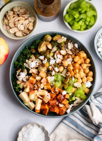 harvest bowl topped with feta cheese, apples, and celery