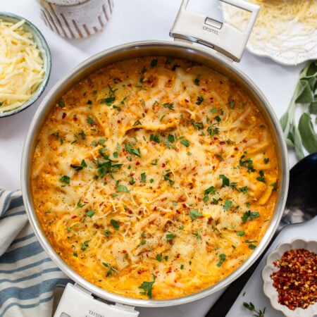 pumpkin lasagna skillet garnished with fresh parsley