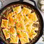 mushroom wild rice pot pie in a cast iron skillet.