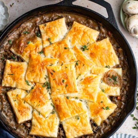 mushroom wild rice pot pie in a cast iron skillet.
