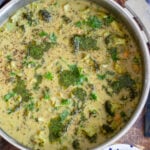 creamy broccoli and chickpea skillet garnished with fresh parsley