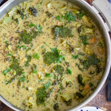 creamy broccoli and chickpea skillet garnished with fresh parsley