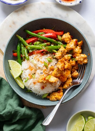 sticky tofu bowl with rice and stir fried veggies