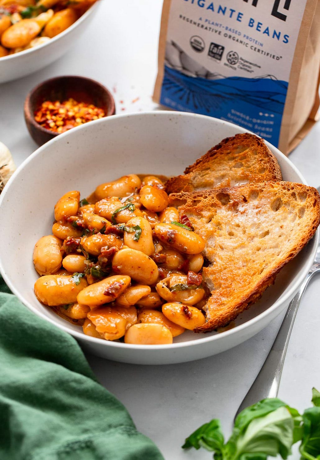 marry me beans in a bowl with sourdough toast