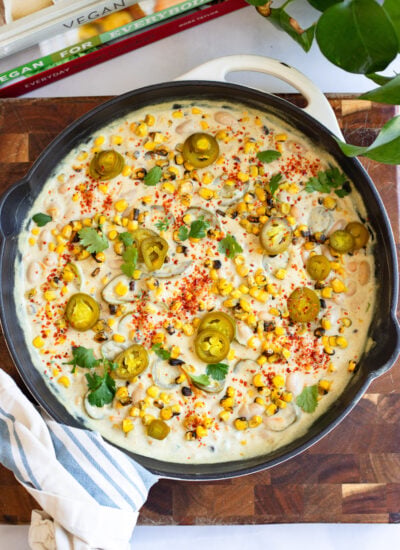 creamy corn jalapeno bean dip in a skillet