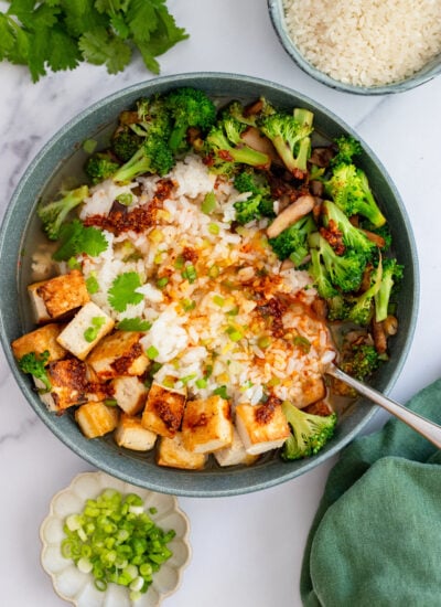 brothy rice bowl with tofu and broccoli
