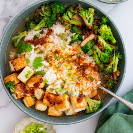 brothy rice bowl with tofu and broccoli
