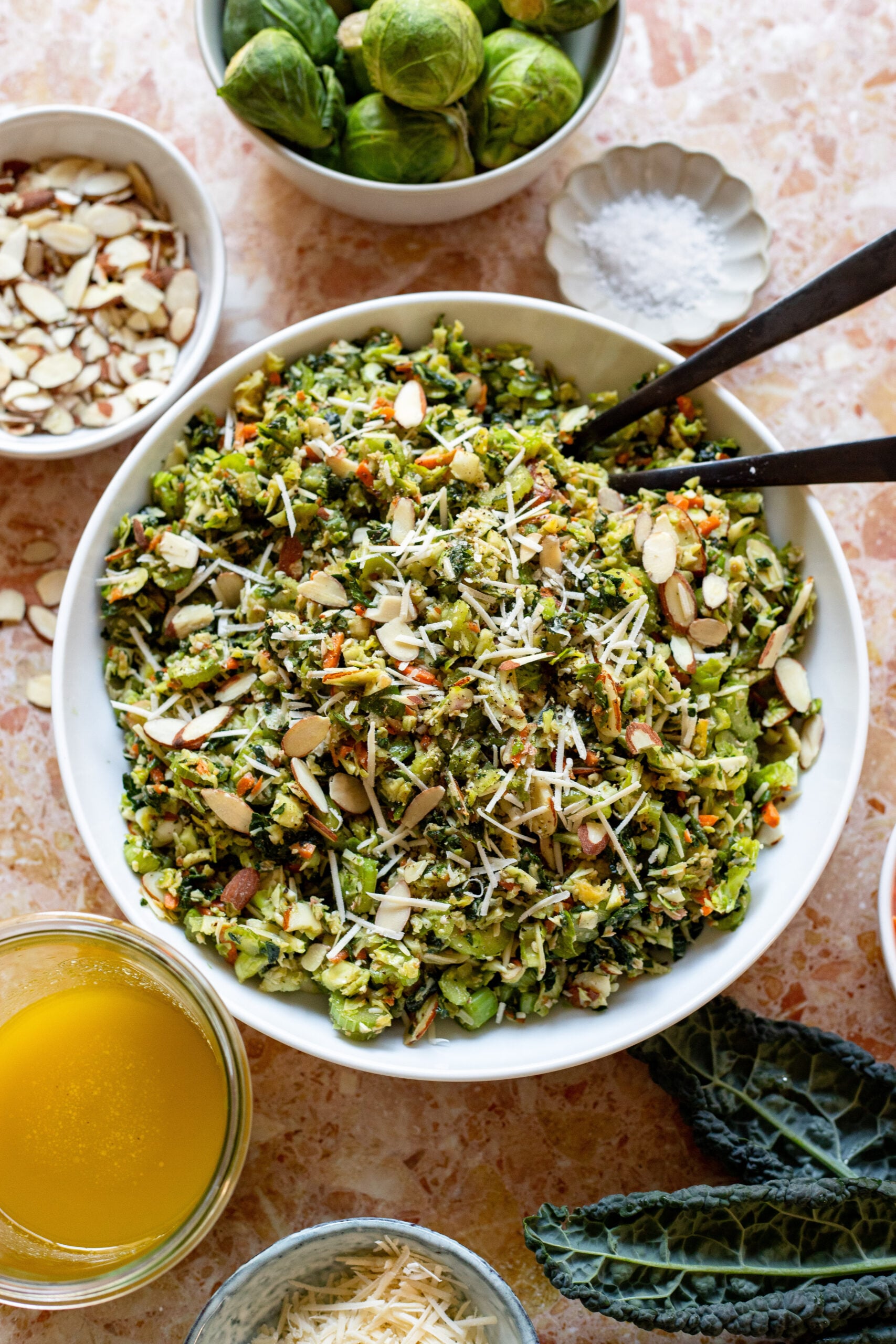 kale brussels and celery slaw in a serving bowl